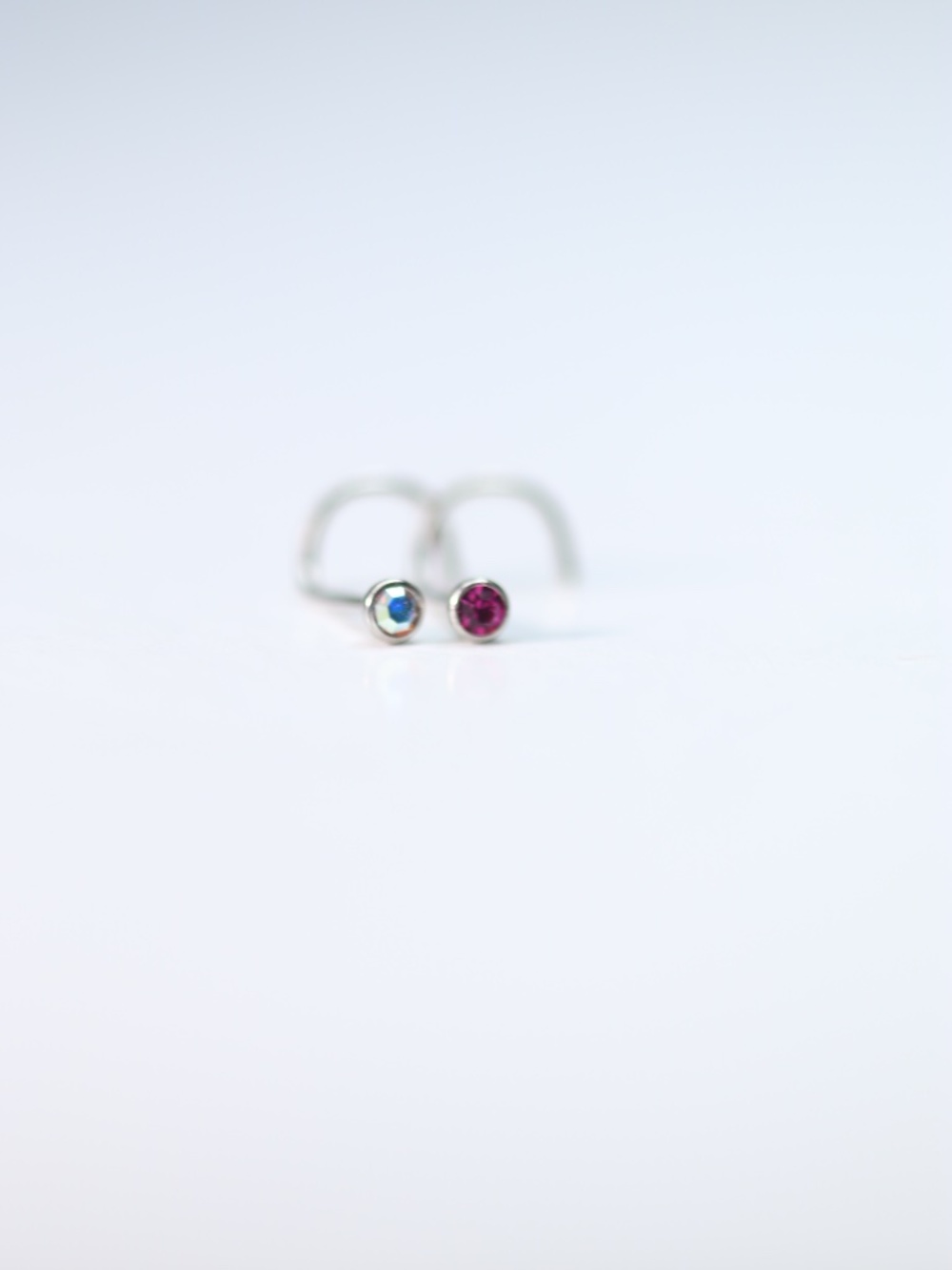Set of Two Corkscrew Nose Piercings with different cute gems New